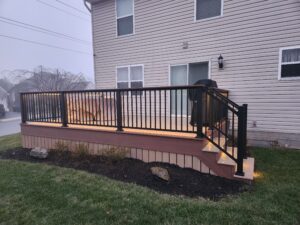 Timbertech PVC Brownstone deck with English Walnut border, strip lights under railing – Lancaster PA