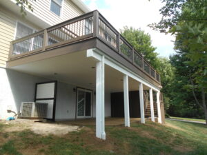 Timbertech PVC American Walnut deck, storage shed under deck, waterproof ceiling with lighting under deck – Lafeyete Hill PA