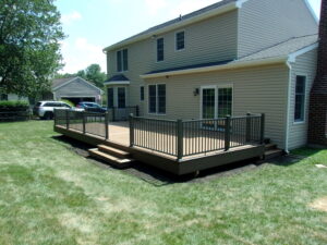 Timbertech Antique Leather deck with Dark Roast border, bronze American series aluminum railing – Downingtown PA