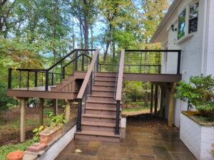 Timbertech PVC English Walnut deck, black American series aluminum railing with horizontal stainless steel cable infill – Wayne PA