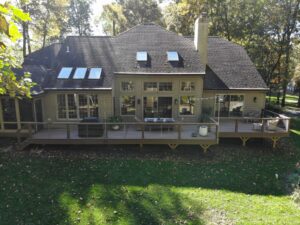 Timbertech PVC English Walnut deck with matching custom railing, horizontal stainless steel cable infill – Kennett Square PA