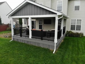 Azek Castle Gate deck, A-frame roof with gable matching deck, black Timbertech radiance railings, – Newtown PA