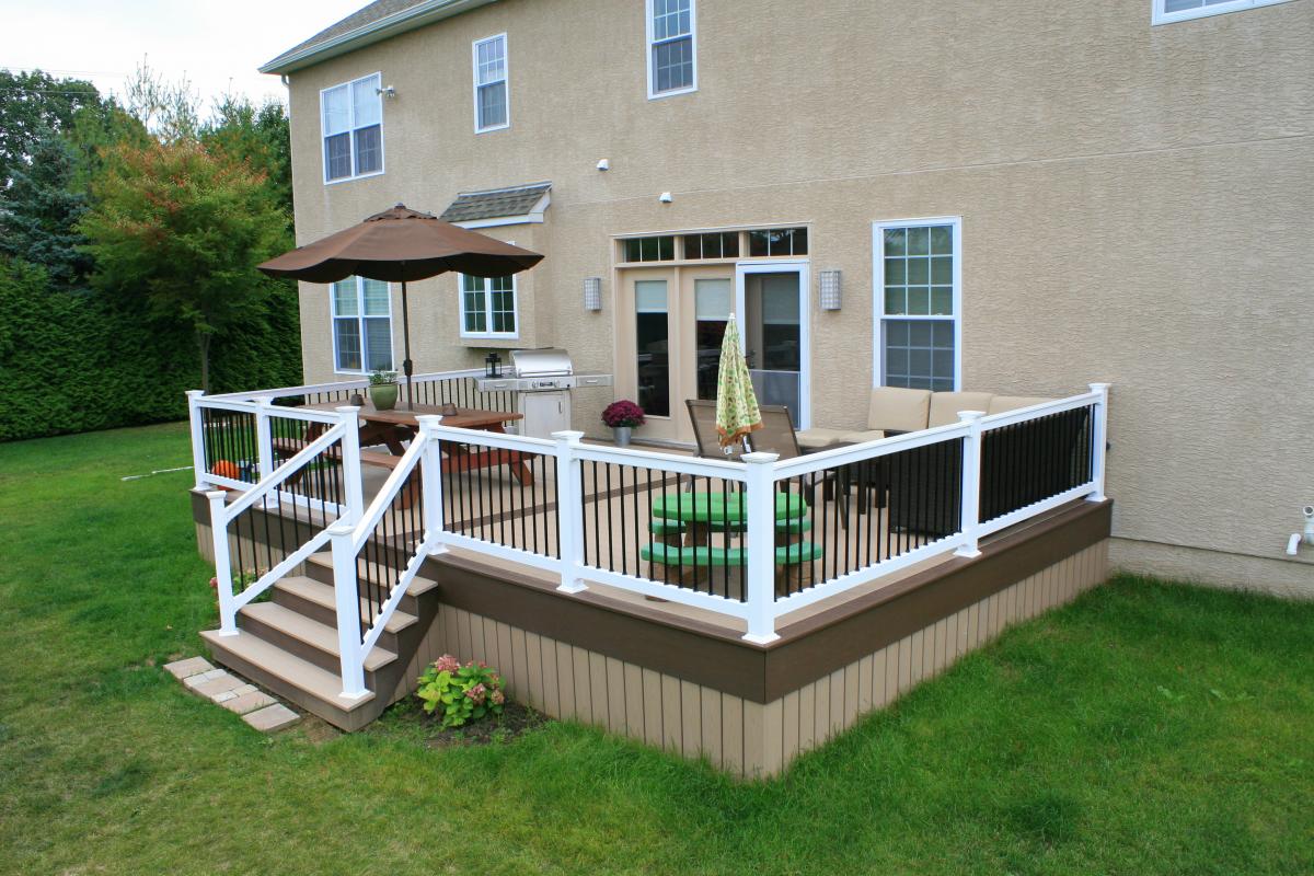 brown deck with white railing