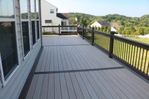 Azek French White Oak deck with American Walnut border and custom matching railings – Pottstown PA