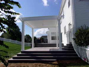 White Vinyl pergola with wide shade slats over an Azek deck – Downingtown PA